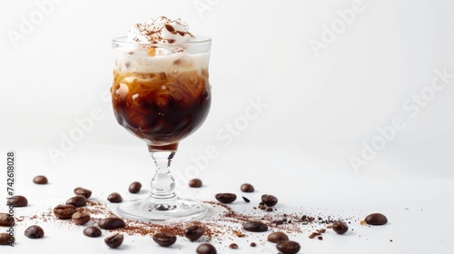 Glass of tasty cold coffee on white background