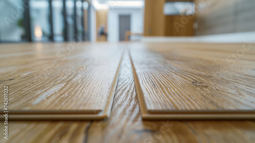 Longitudinal lock joint - The sequence of technological methods for laying and installation of floating flooring - laminate - professional work - selective focus photo