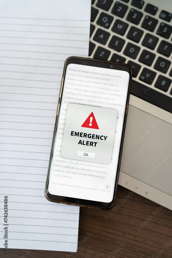 Emergency alert notification appearing on the phone while in use.