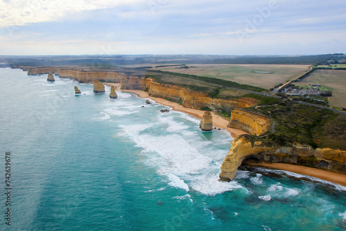 Aerial view of the Australian coastline at the Twelve Apostles in the Port Campbell National Park - Collection of limestone stacks in the Tasman Sea off the coast of Victoria, Australia