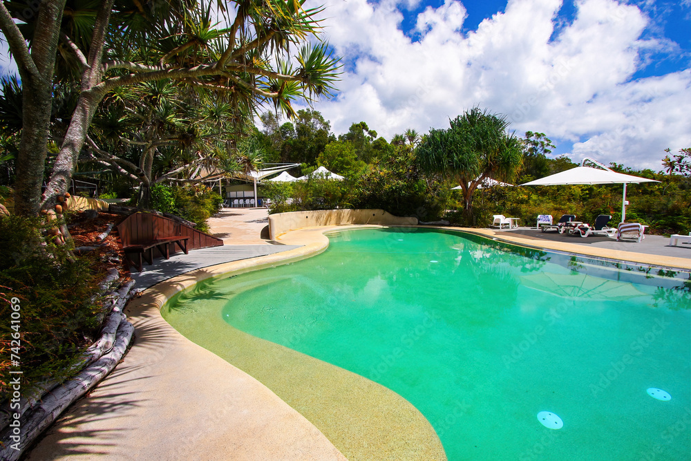 Outdoor swimming pool of the Kingfisher Bay Resort on the west (continental) coast of Fraser Island in Queensland, Australia
