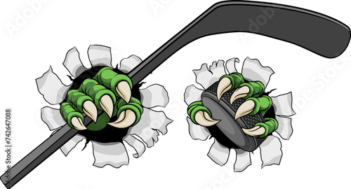 An ice hockey claw sports illustration of an eagle or animal monster hand holding a hockey stick and puck