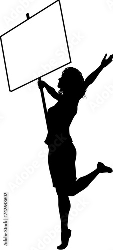 Protestor or demonstrator at a demonstration march, picket line or strike protest rally in silhouette. Holding up a banner or picket sign board placard.