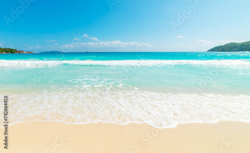 Sunny day in a tropical beach with golden sand