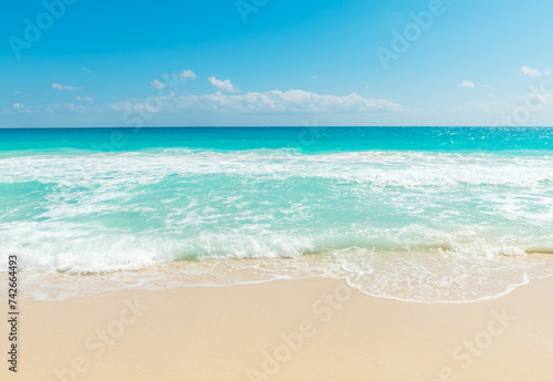 Turquoise water and golden sand in a tropical beach
