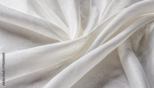 white luxurious background the fabric lies in soft waves chiffon translucent material top view pleats made of light fabric wedding backdrop