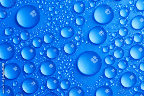 Wallpaper Mural many small water drops on a blue surface Torontodigital.ca