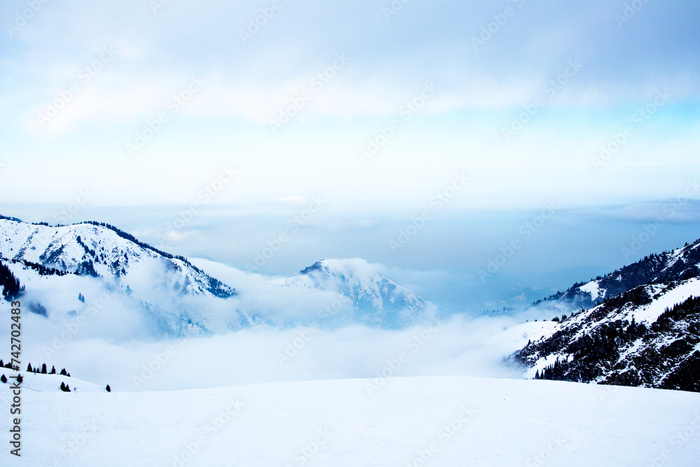 Fototapeta premium panorama of mountains. clouds on top of mountains