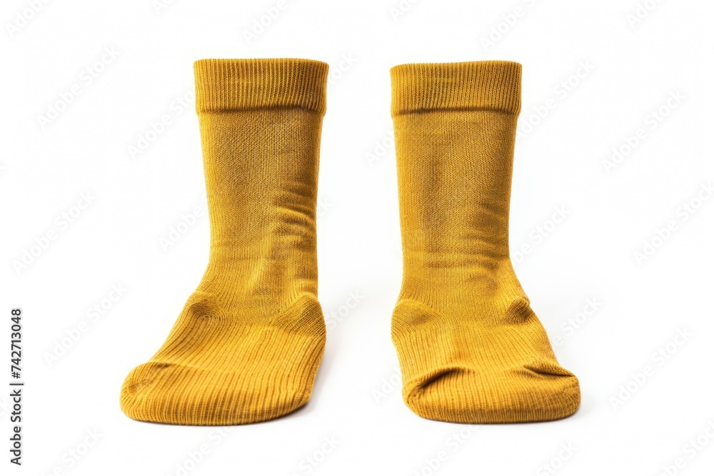 Yellow socks on a plain white background, suitable for fashion or textile design projects Yellow socks on a plain white background, suitable for fashion or textile design projects