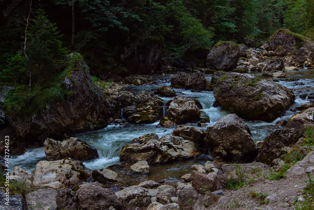 Mountain river flowing in the rocky Bicaz Gorge (Romanian: Cheile Bicazului) situated in the central part of the Hasmas Mountains, and it is part of the National Park, Romania Mountain river flowing in the rocky Bicaz Gorge (Romanian: Cheile Bicazului) situated in the central part of the Hasmas Mountains, and it is part of the National Park, Romania