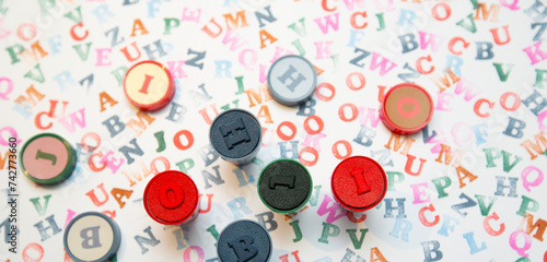 colored letters and stamps on a white background