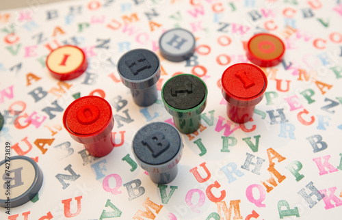 colored letters and stamps on a white background