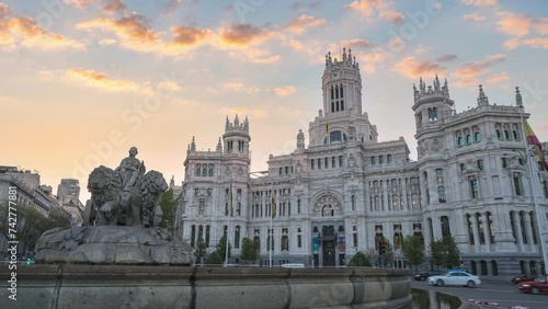 Madrid Spain time lapse, city skyline sunrise at Cibeles Fountain and Palace photo