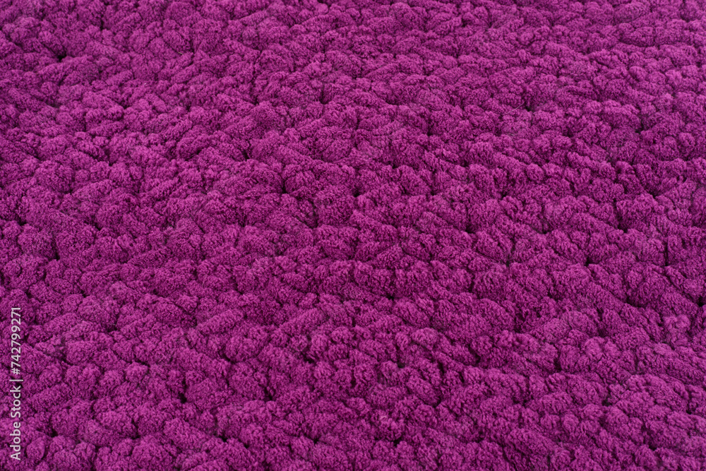 Violet, purple, plum soft and fluffy knitted texture, background Violet, purple, plum soft and fluffy knitted texture, background
