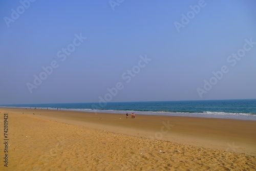 people walking on beach 19 feb 2024 , Golden Beach, Puri, Odisha