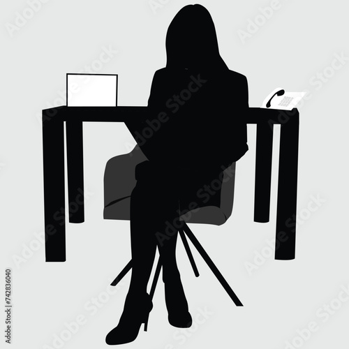 silhouette of a person sitting on a chair