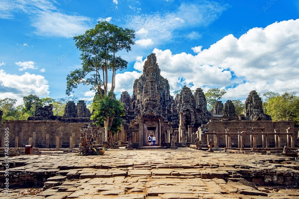 Naklejka premium Bayon Temple With Giant Stone Faces Angkor Wat Siem Reap Cambodia