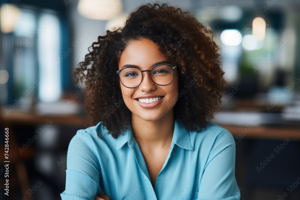 Portrait of a beautiful afro woman smiling in the office Portrait of a beautiful afro woman smiling in the office