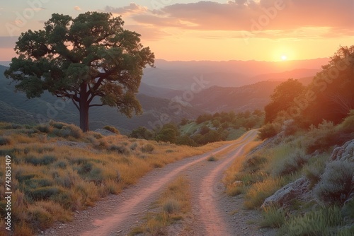 Dirt road in the mountains at sunset