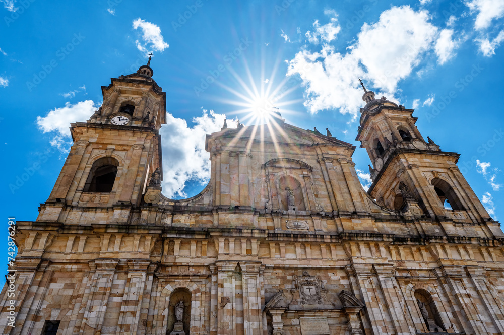 Facade of the cathedral in Bogota, Colombia with a stunning sunburst