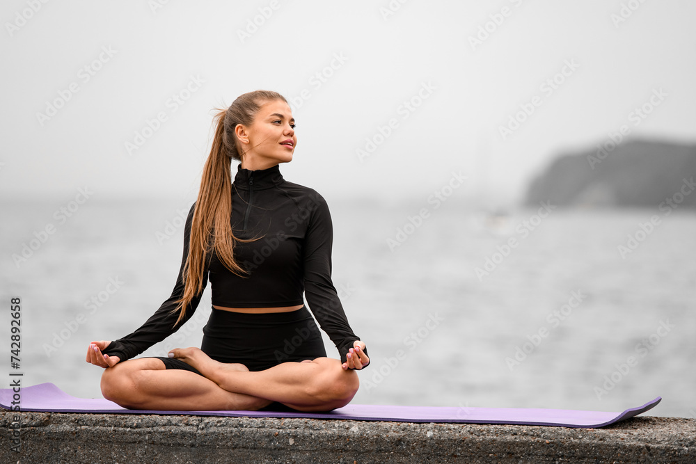 Lotus harmony. Young girl seashore wellness practice.