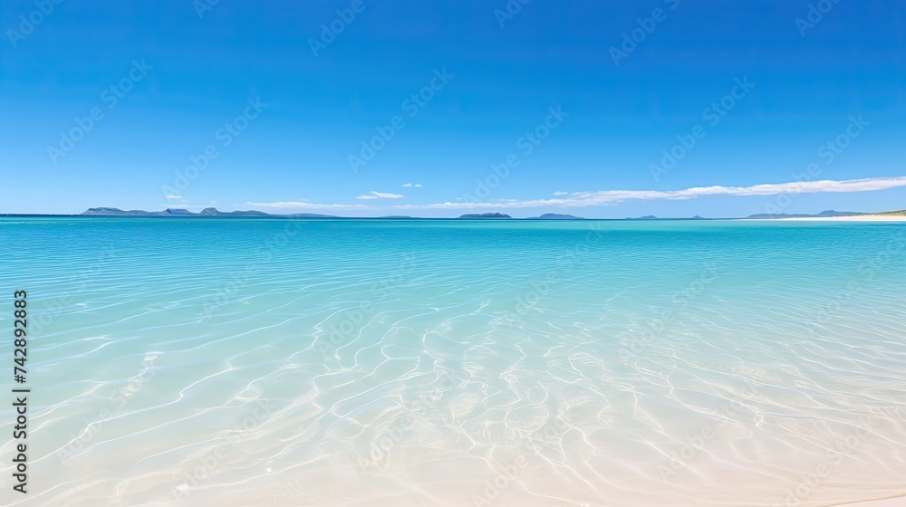 A photo of a lagoon with a sandy beach