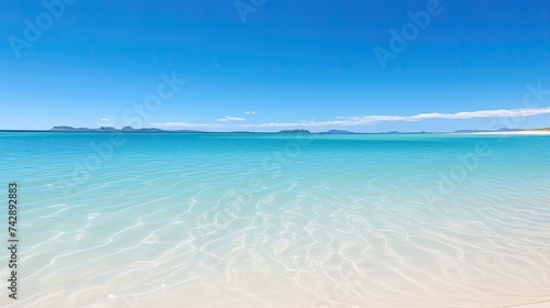 A photo of a lagoon with a sandy beach