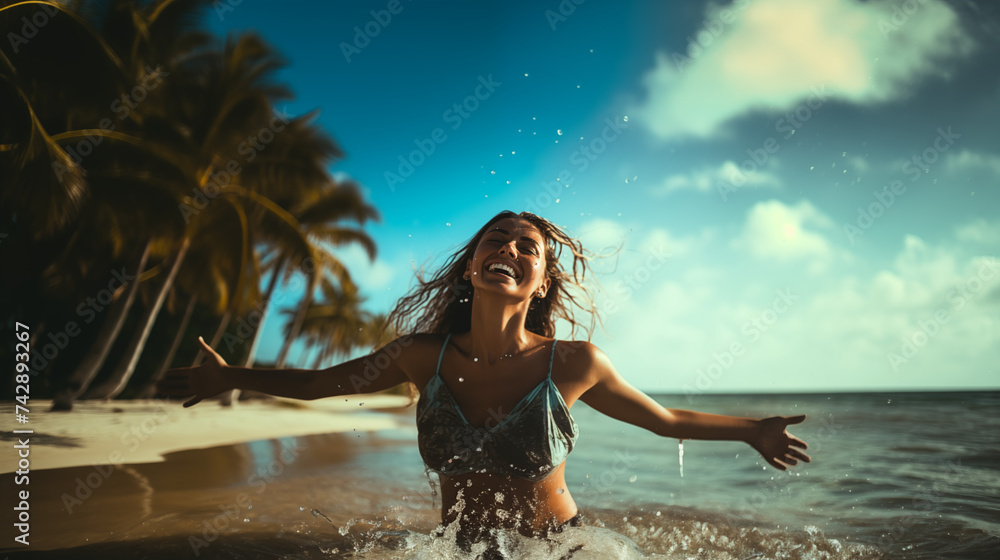 Young woman running into sea with splashes, Happy beautiful woman running on the beach