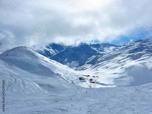 snow covered mountains in winter © Zhanna