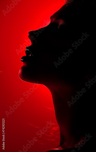silhouette Beauty fashion Girls stand in the dark Red, neon colors, low light key, studio light, body outline, lips