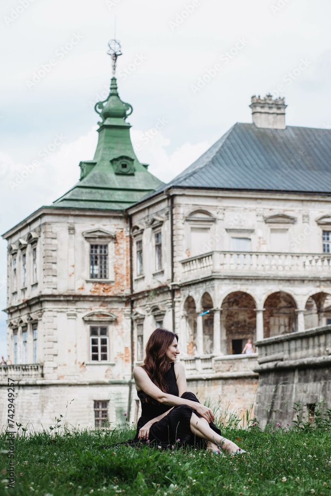 A young woman near the Pidhoretsky Castle, Ukraine.