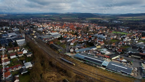 Aerial around the old town of the city Alsfeld in Hesse, Germany on a sunny day day in winter  © Barny_Media