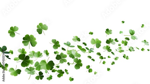 Green flying clover leaves isolated on white background. Spring decoration for Saint Patrick's day border or frame design