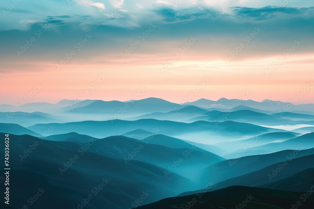 Landscape with rays of light through layers of mountains