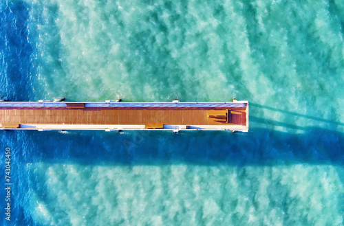 Aerial view of Vero Beach Pier in turquoise waters, Vero Beach, Florida, United States. photo