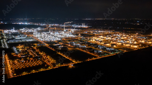 Aerial view of Leuna, Saxony at night with industrial complex and illuminated refinery, Saxony-Anhalt, Germany. photo