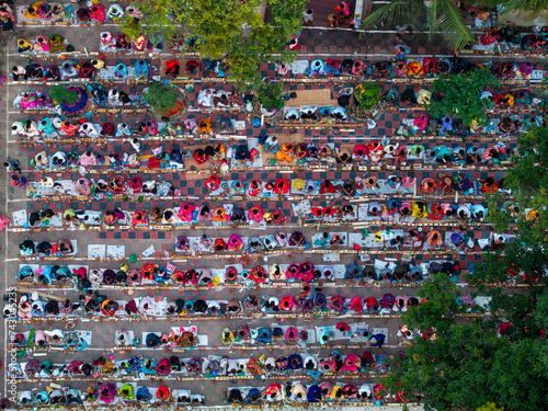 Aerial view of people praying at an ancient mosque during Eid festival, Kishoreganj, Bangladesh.