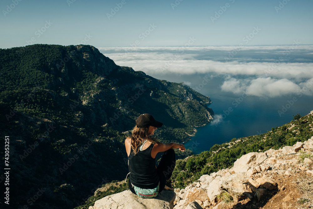Hiking on Lycian way. Woman with backpack is trekking in beautiful nature
