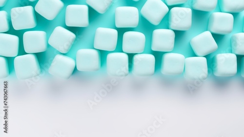 Marshmallows in bright turquoise, cube-shaped, aligned neatly on a white background, vibrant lighting, modern and playful setup Generative AI