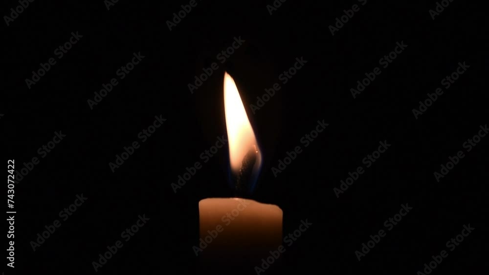 Close up single candle blown in the dark Close up single candle blown in the dark