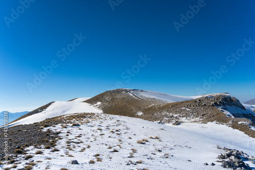 Albania mountains, The peak of Kendrevica in clear sky, hiking. photo