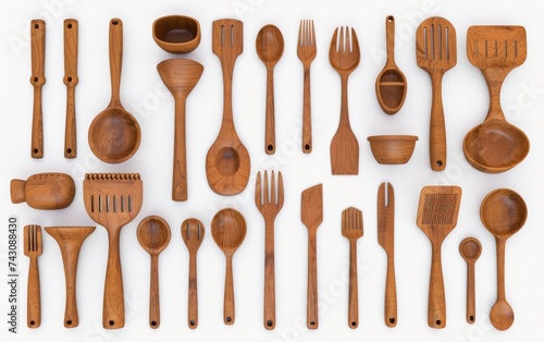 Assorted Wooden Kitchen Utensils Arranged Neatly on a White Background