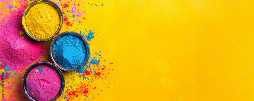 Holi background. Bowls of colorful gulal powder on yellow table flat lay with copy space. Festive Indian happy holidays greeting card, invitation or banner. Hindu festival of colours 8k backdrop. - obrazy, fototapety, plakaty 