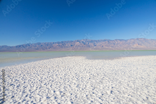 Lake Manly and salt flats at Badwater Basin in Death Valley National Park  California