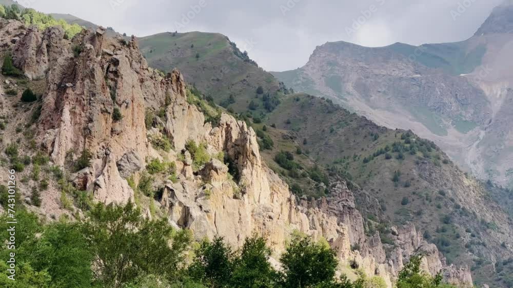 Mountain landscape of the Fan Mountains on a sunny summer day, Tajikistan, Central Asia. Fan Mountains in the heart of Tajikistan. 4K Mountain landscape of the Fan Mountains on a sunny summer day, Tajikistan, Central Asia. Fan Mountains in the heart of Tajikistan. 4K