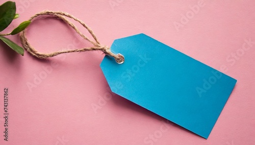 blue price tag on the pink background