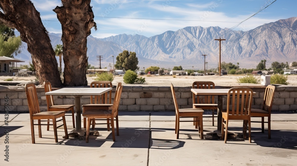 Empty tables at sidewalk cafe, Lone Pine, Inyo County, Onyx, California, USA.



