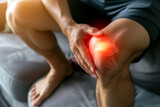 Man suffering from knee pain in medical office. Pain in the knee.
