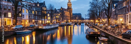 Amsterdam Nightscape: Tranquil Evening Along the Illuminated Canal