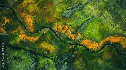 Aerial Abstract Background with Green and Orange Rivers amidst Nature Landscape Enhanced by Topaz photo